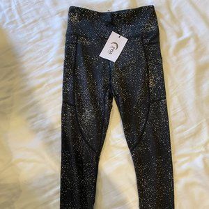 ZYIA Size 4 Black Reflective Pocket Light n Tight Hi-Rise 7/8. Retail value: $79